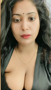 Anjaani Bhabhi in Black Nighty Deeper Cleavage